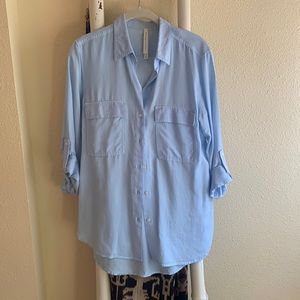 The Group by Babaton Utility shirt.